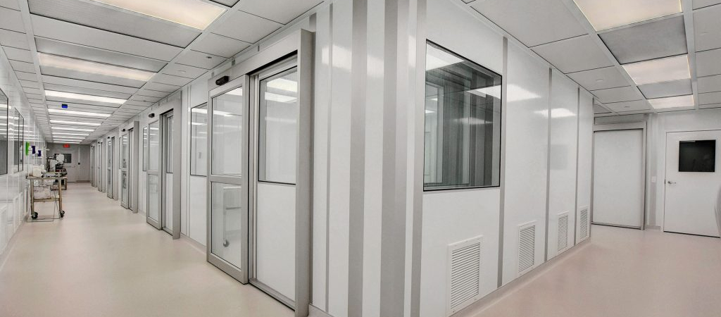 Modular cleanroom by Allied Modular with enclosed panels, sliding doors, and integrated ventilation.