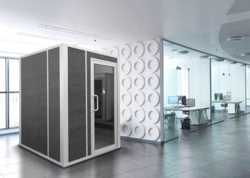 A modern lactation pod situated in an office environment provides a private and comfortable space for nursing mothers.