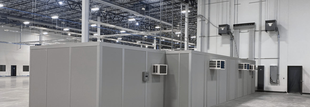 In-plant office facilities within a large warehouse.