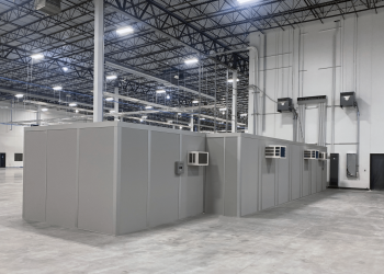 In-plant office facilities within a large warehouse.