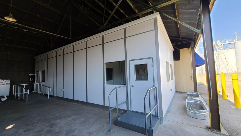 A modular office in a warehouse.