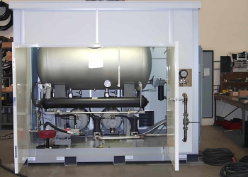 A small pump house enclosure with doors open.