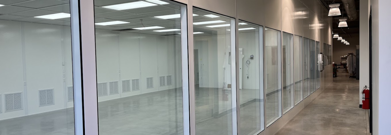 Modular commercial interior with glass panels by Allied Modular.