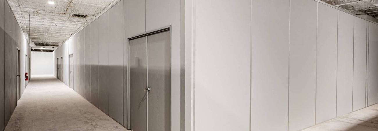 Modular warehouse office with double doors by Allied Modular.