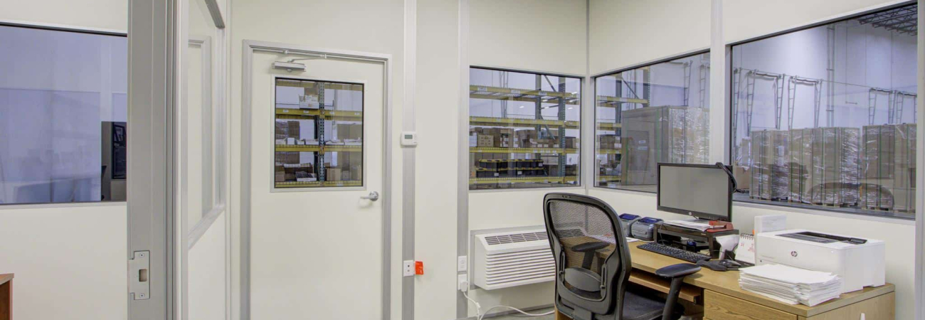 Interior of temporary office buildings by Allied Modular, used as a temporary office building inside a warehouse.