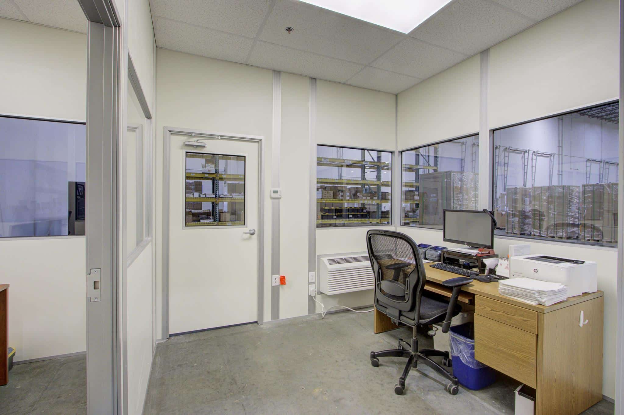 177EWingoRd(Quadient)_09 Interior of temporary office buildings by Allied Modular, used as a temporary office building inside a warehouse.