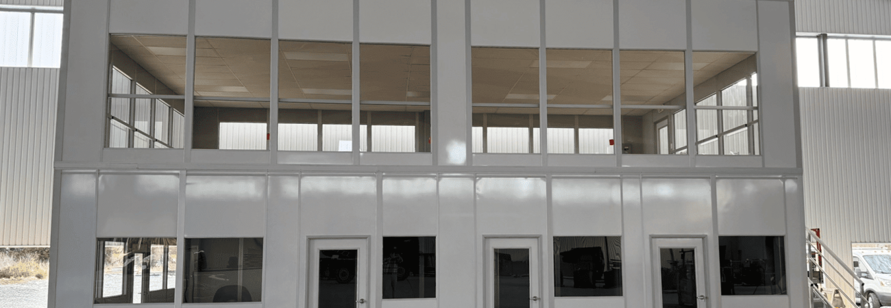 Allied Modular warehouse mezzanine office with upper-level workspace and steel stair access