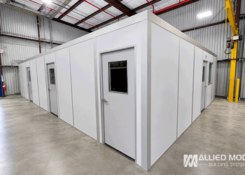 Modular Office With 3 doors on front and one on the side.
